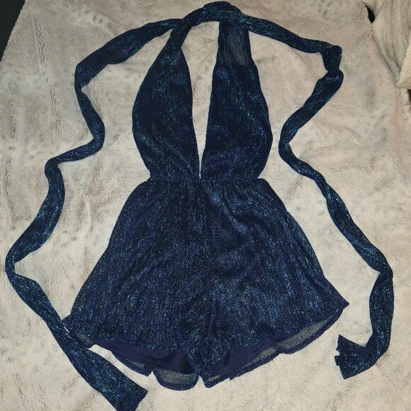 Blue shimmery romper with long tie down the back. - Picture 1 of 6